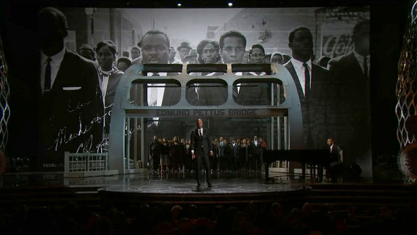 Image: Still from performance of John Legend and Common performing