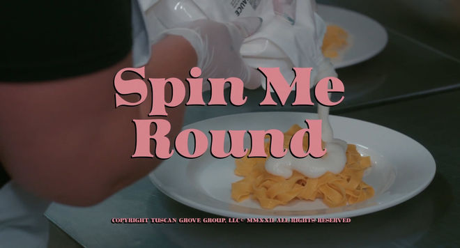 IMAGE: Spin Me Round (2022) main title card