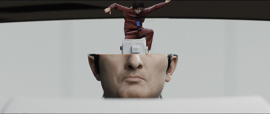 IMAGE: Figure falling into big head with computer