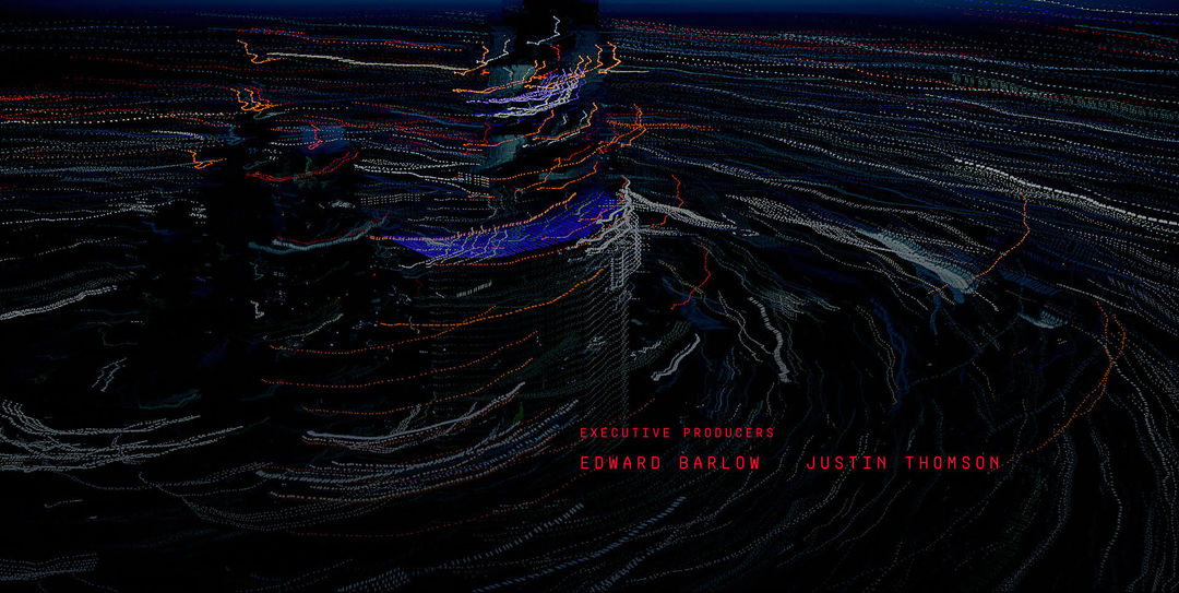 IMAGE: Still - Glitch effect on top of footage with the credits Executive Producers Edward Barlow and Justin Thomson